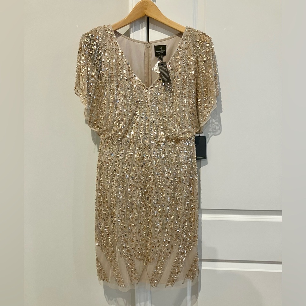 ADRIANNA PAPELL  NWT size 10
Flutter Sleeve Dress
Sequin embellished
